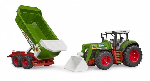 Traktor z ładowaczem czołowym i przyczepą Traktor z ładowaczem czołowym i przyczepą